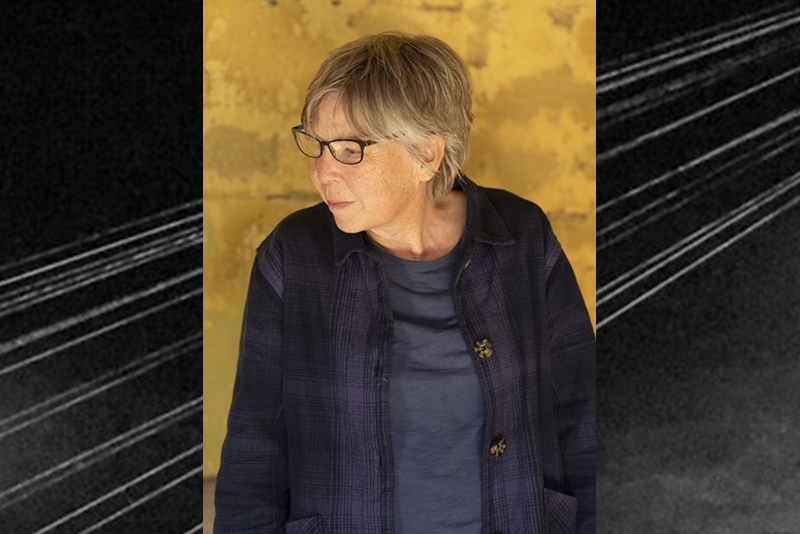 A color portrait of Ellen Fullman, standing in a blue shirt looking down and to the right, in front of a golden wall. Overlayed on a black and white image of The Long String Image with a dozen strongs diagonally crossing the frame. Photos by Theresa Wong and Wendy Coutau. Photos courtesy of the Artist.