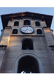 The Julia Morgan Bell Tower at the Milsl COllege campus, a tall reinforced concrete structure. Photo courtesy of Mills College.